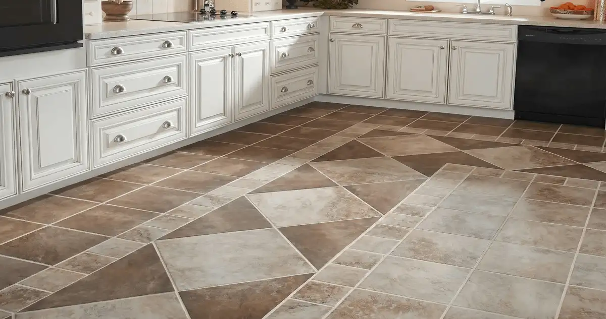 Kitchen with white cabinets and a professionally installed tile floor in Louisville, KY